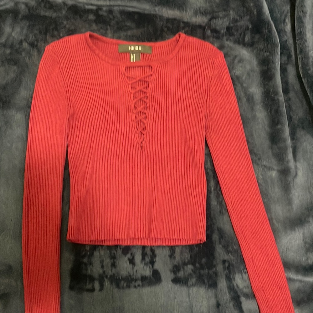 Long sleeve medium top a little cropped.